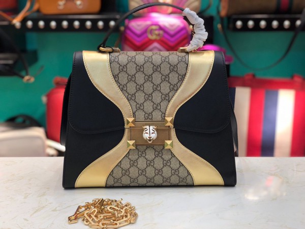 Gucci GG medium top handle bag