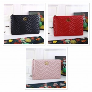 Gucci GG Marmont quilted leather clutch bag