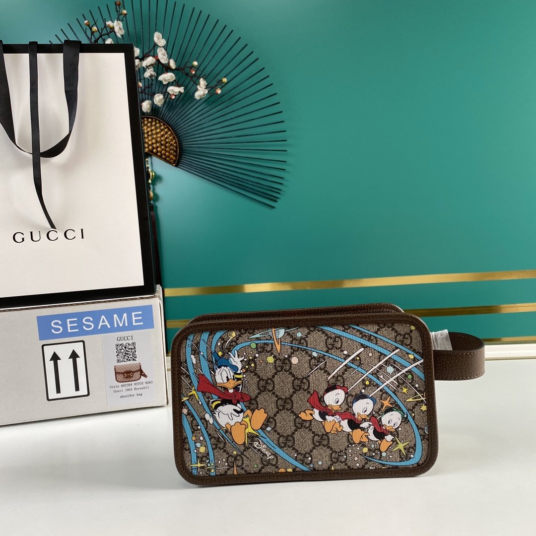Disney x Gucci Donald Duck cosmetic case ModKicks